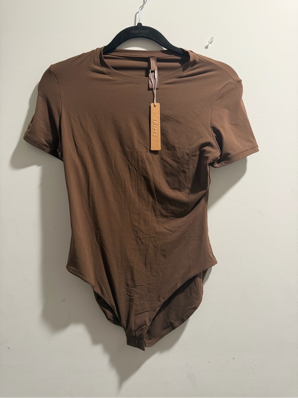 SKIMS Men's Short Sleeve Crew Neck Bodysuit in Brown